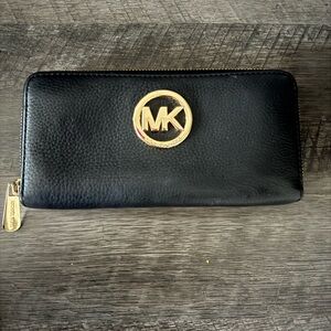 Michael Kors Black Zip-Around Wallet with Gold Emblem